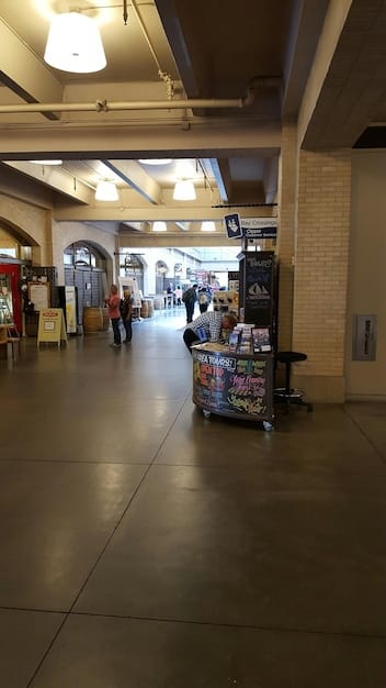 An image of a nearly empty shopping mall, symbolizing the decrease in consumer spending due to economic concerns.