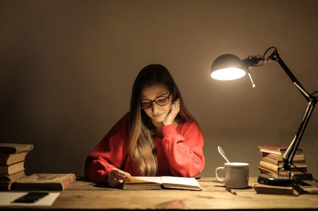 A student sitting at a desk, illuminated by a desk lamp, with textbooks and a laptop. The student appears focused but stressed, depicted by hands running through hair and a pile of unopened mail suggesting bills and responsibilities.