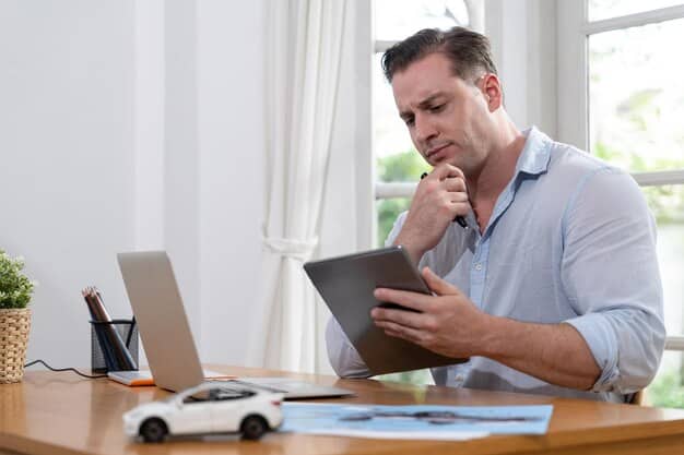 A person filling out a financial aid application on a tablet, with a thoughtful expression, emphasizing the process of investigating available programs.